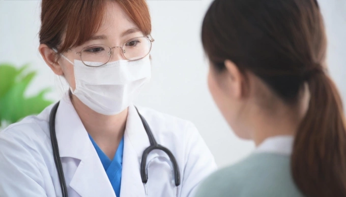 Minh họa phụ nữ khám sàng lọc với bác sĩ. Ảnh: PhotoAC