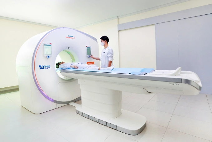 Bệnh nhân chụp CT kiểm tra tổn thương tại phổi. Ảnh: Bệnh viện Tâm Anh