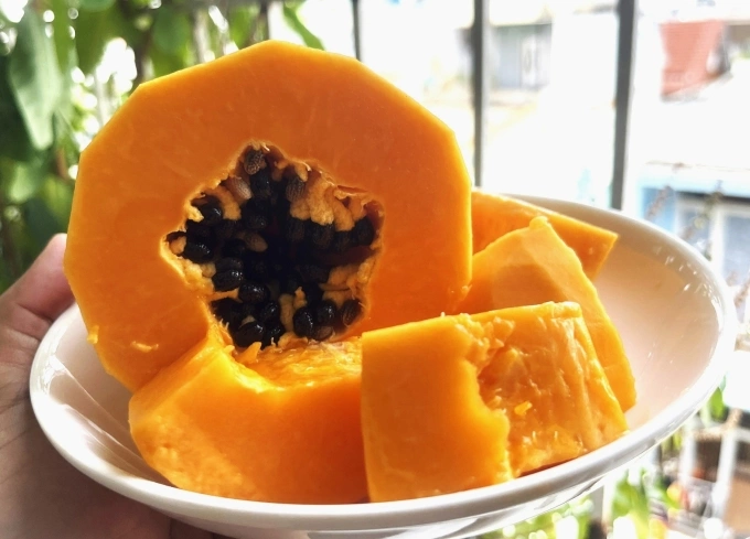 Bổ sung đu đủ thường xuyên giúp làn da sáng khỏe, giảm lão hóa. Ảnh: Đình Diệu